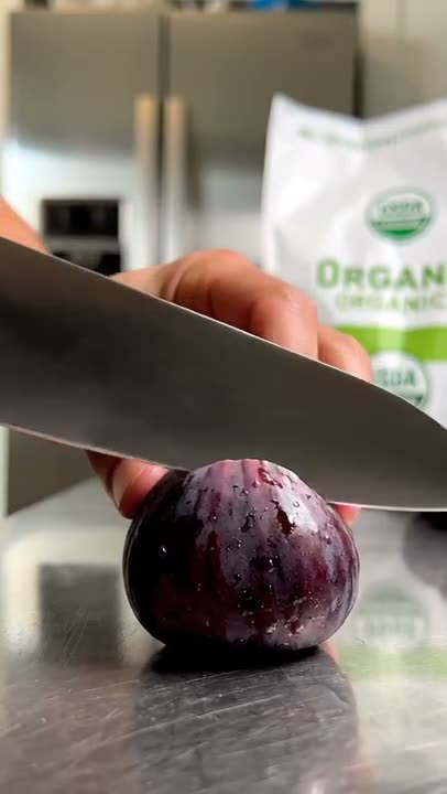 A glass fig being sliced